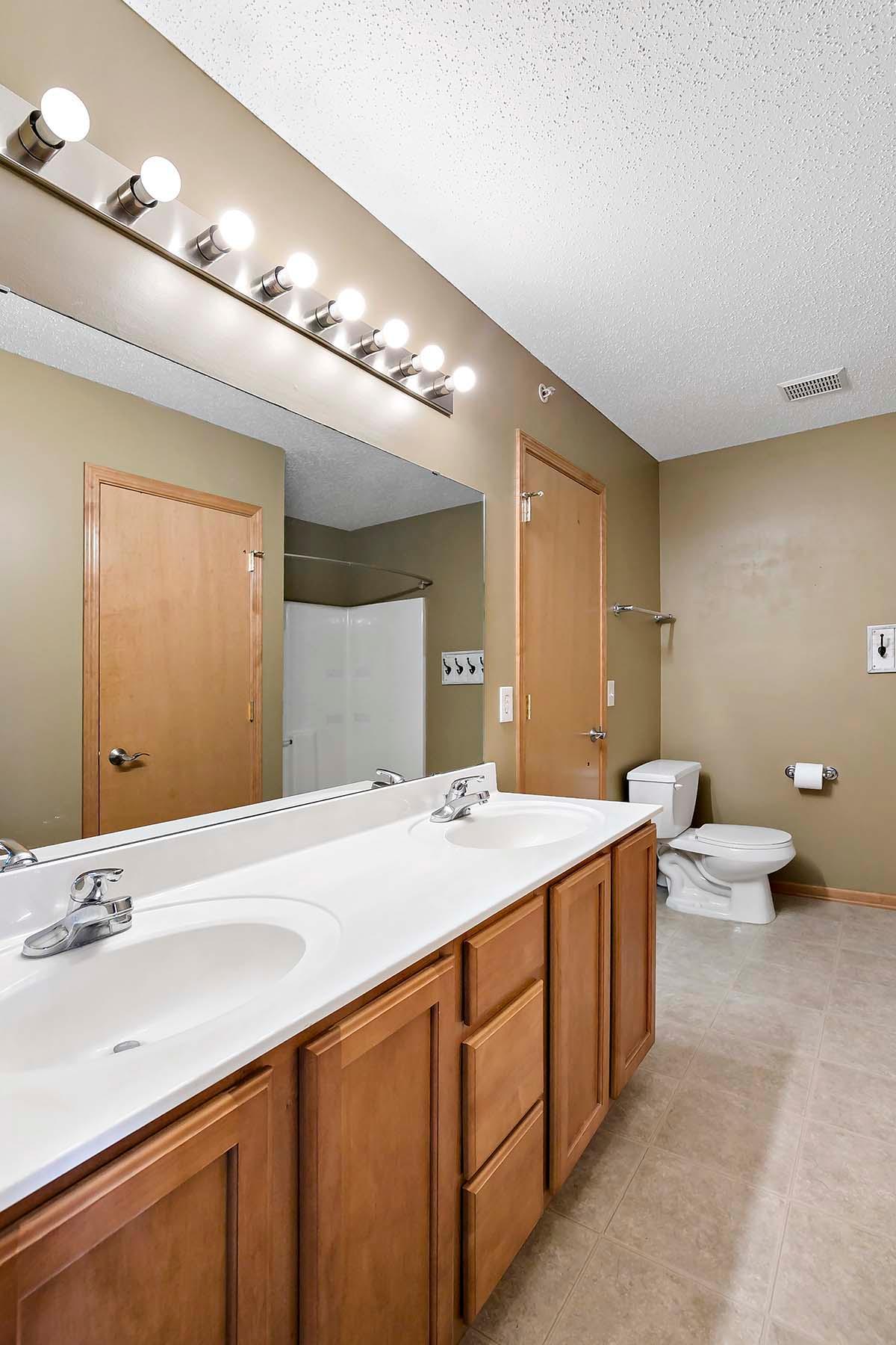 Primary ensuite bath on the upper level.