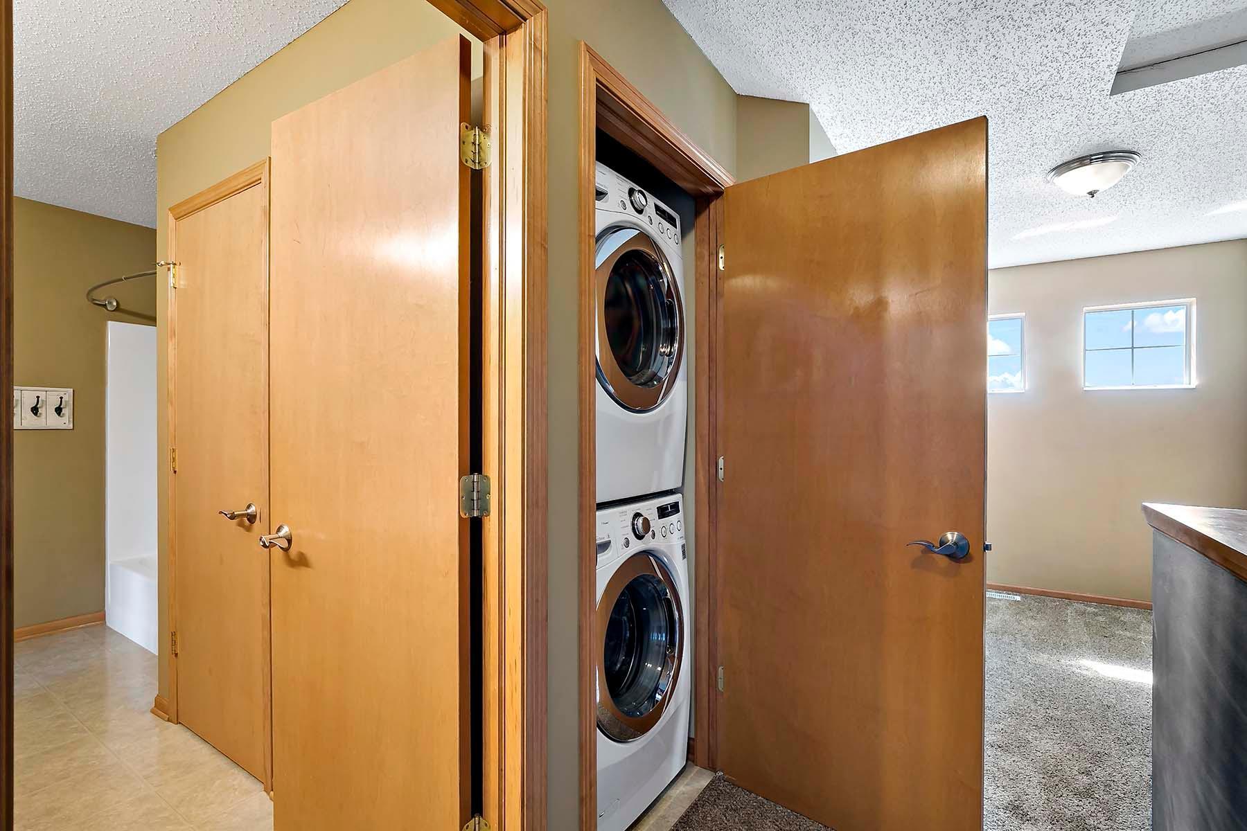 Washer & dryer neatly tucked away on the 2nd floor closet to avoid hauling laundry up and down stairs. Water softener included to ensure clothes get clean.