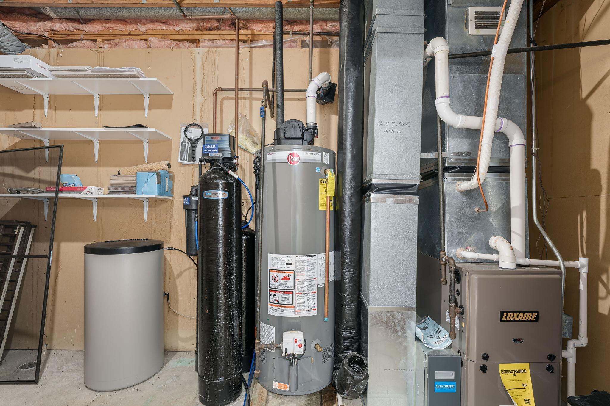 The home is outfitted with a reverse osmosis and iron treatment water system, providing clean, high-quality water throughout the property.