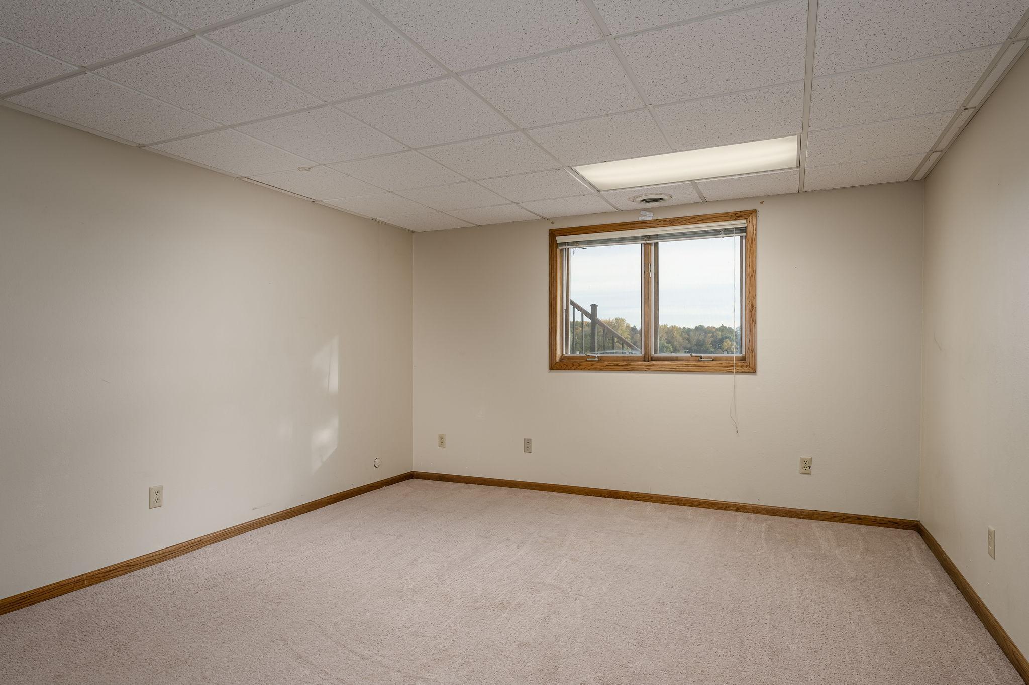 Lower level bedroom #4 with lake views