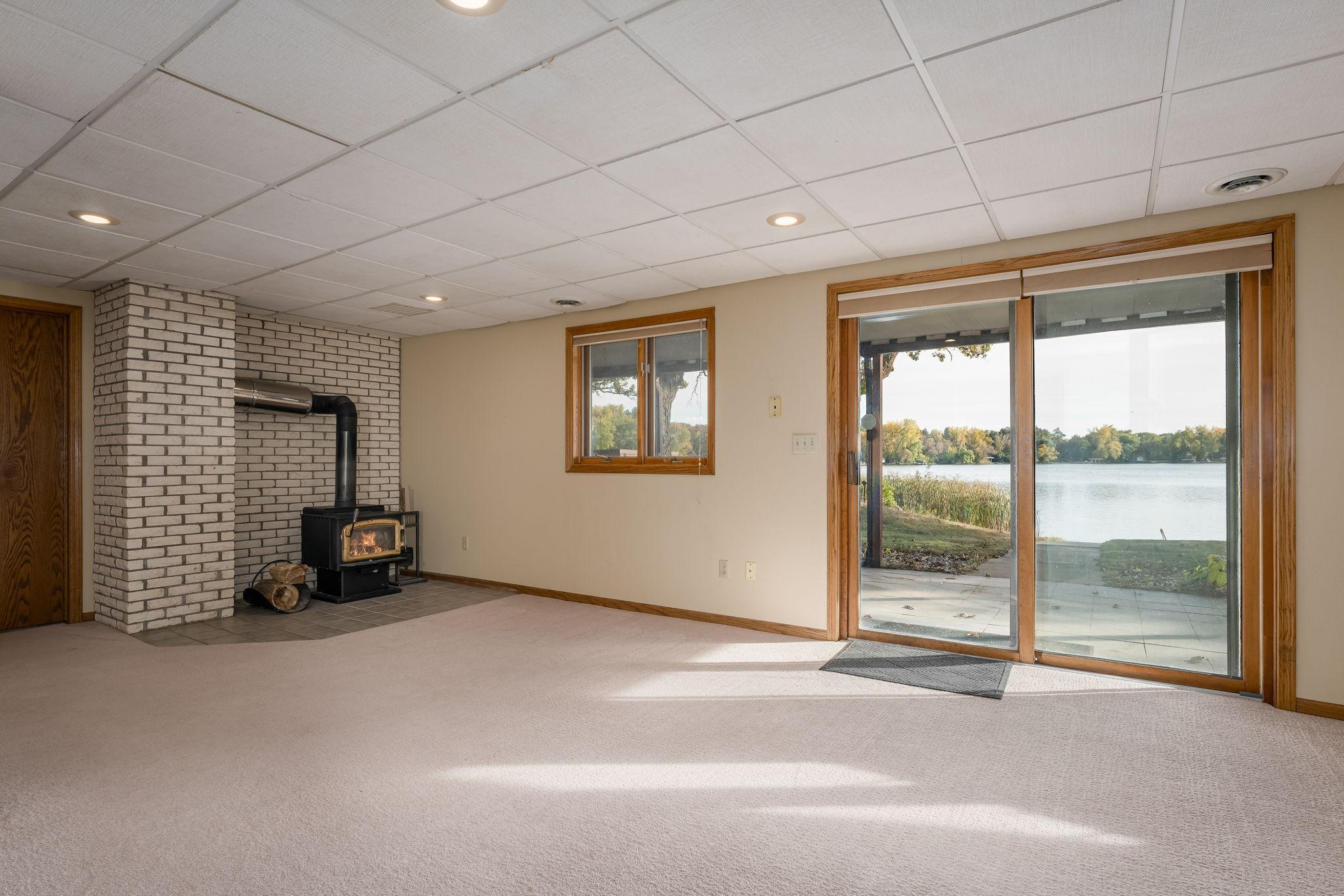 The expansive family room features a cozy and inviting atmosphere for gatherings and relaxation.
Wood Stove no longer in home.