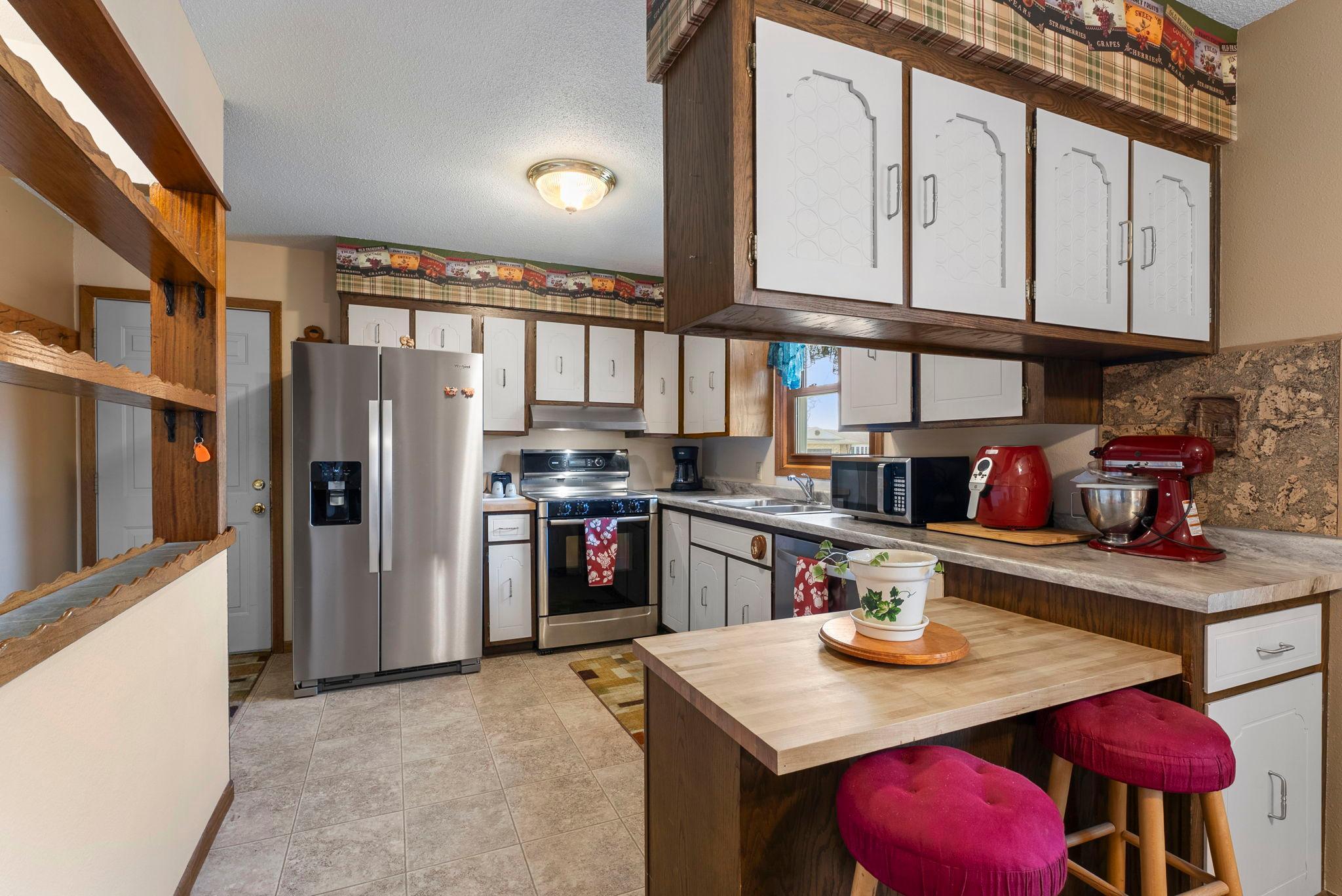 Bright kitchen with newer appliances