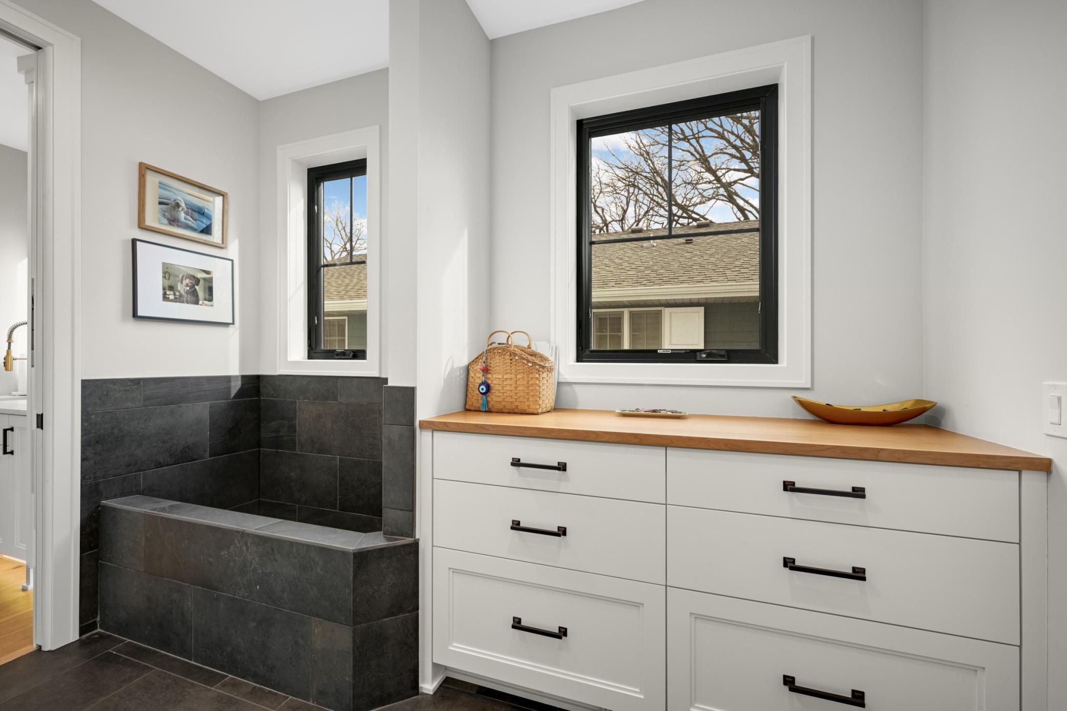 Pet wash off the mudroom and garage. Attached heated garage with EV p