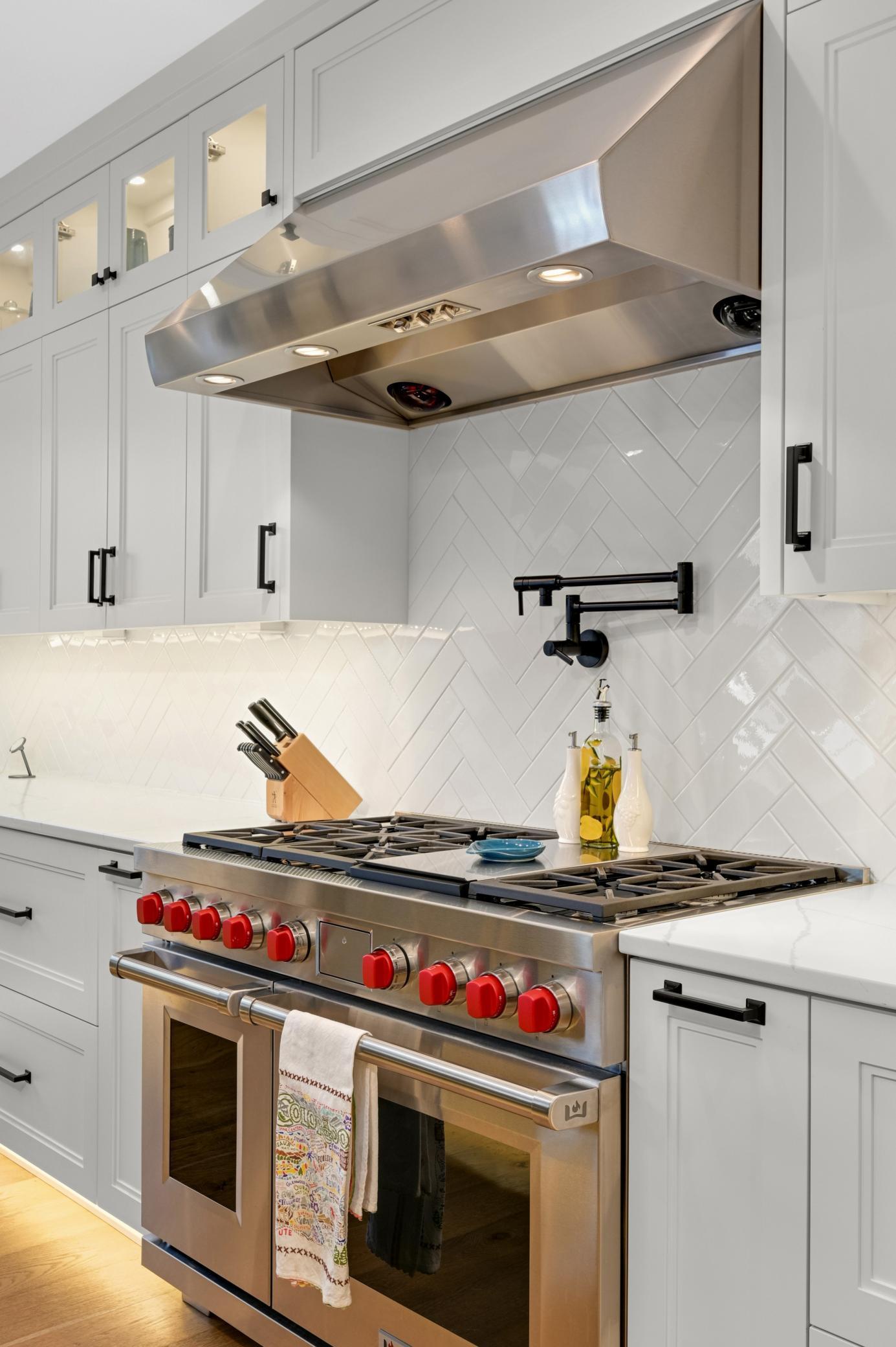 Gourmet chef kitchen with Wolf appliances and Sub-Zero refrigerator