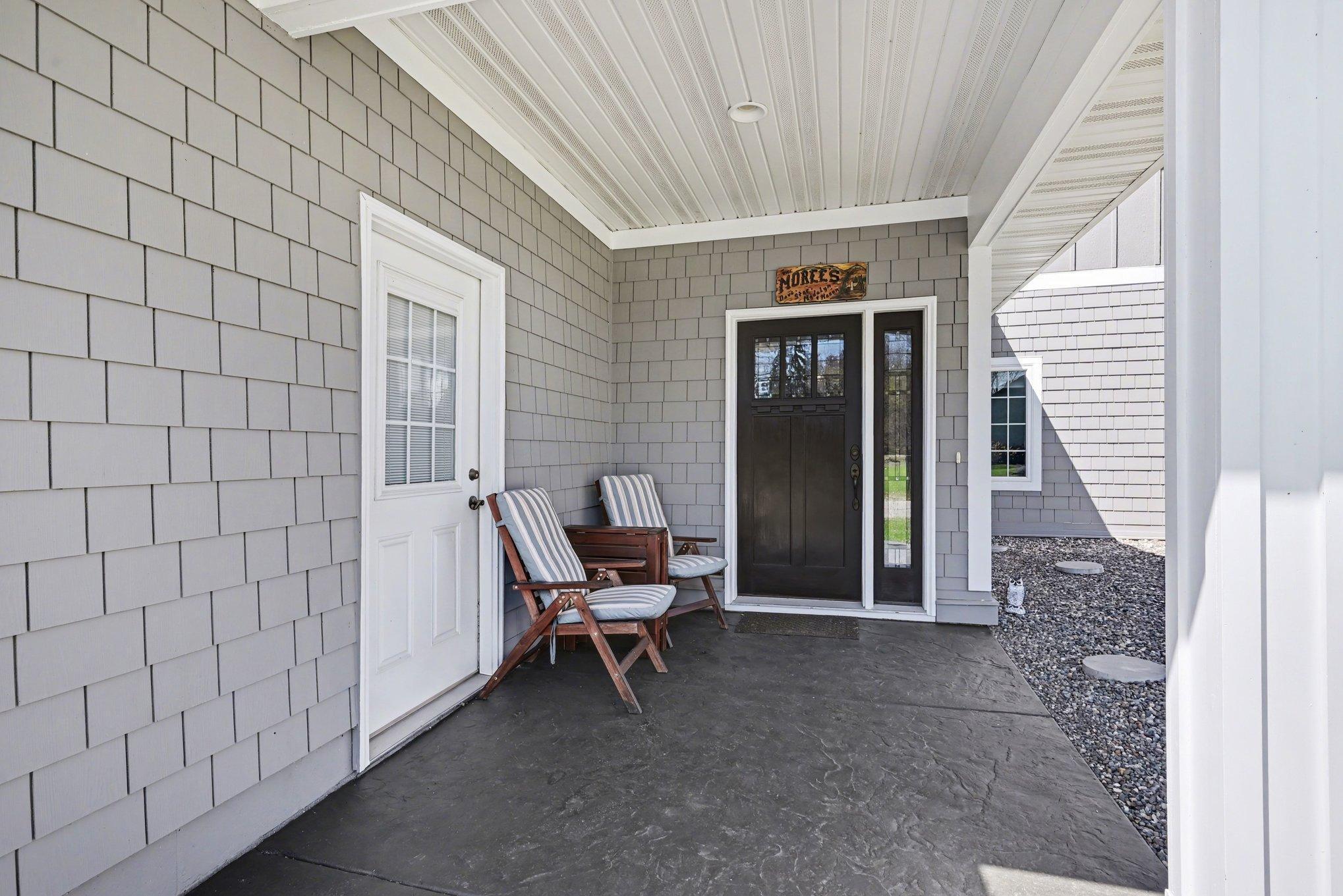 Covered entrance on stamped concrete