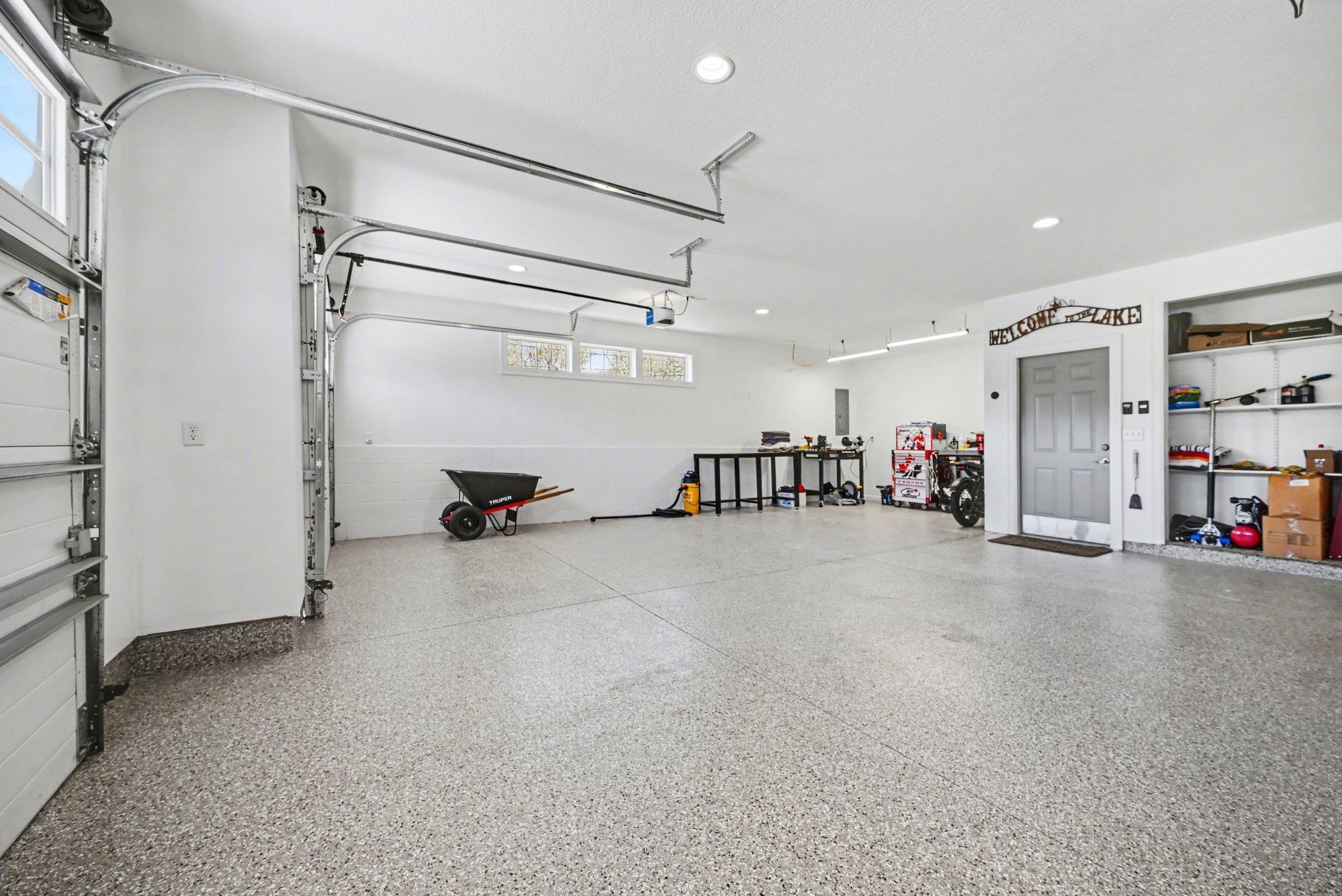 Fully finished garage with new flooring