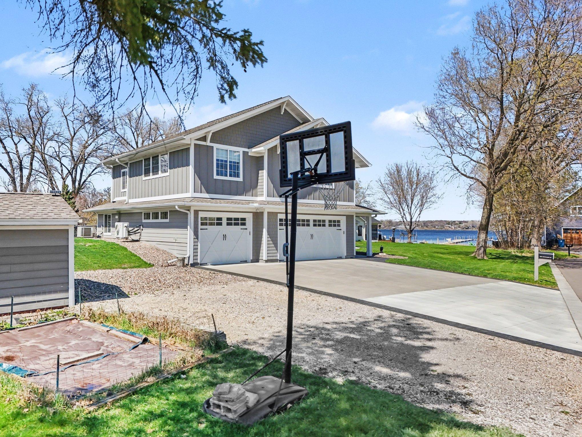Large 3-car garage and additional storage building