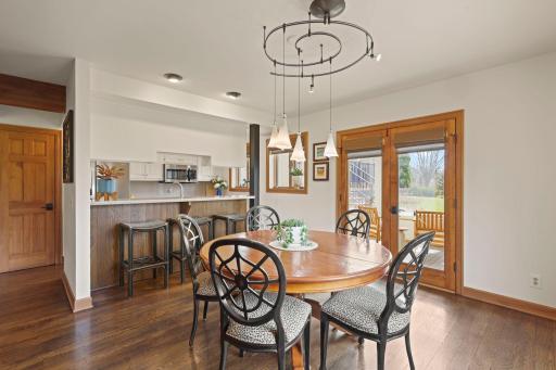 Large dining space with access to backyard atrium