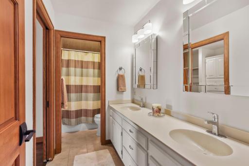 3/4 bathroom complete with double vanity.