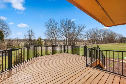 New maintenance free deck with sweeping backyard views.