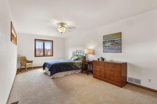 Step up to the top level where the largest bedroom sits.