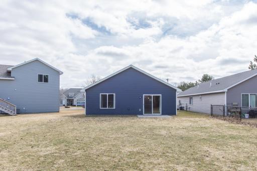Enjoy low-maintenance living with professional landscaping already in place.