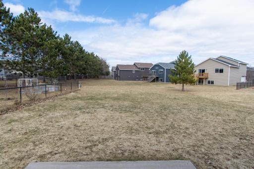Nicely maintained yard with irrigation system for easy upkeep.