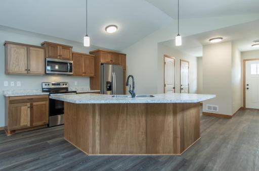 Thoughtfully designed kitchen with ample prep space and a large island ideal for everyday use.