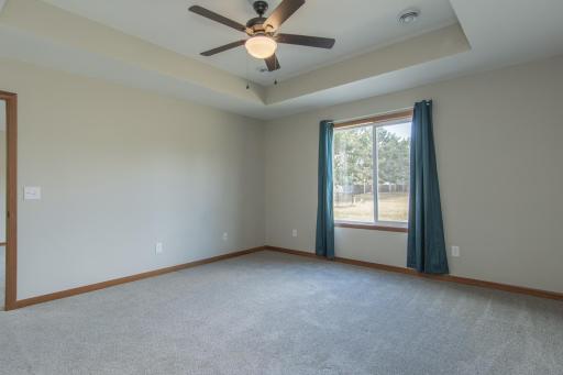 Well-sized primary bedroom with great natural light and functional layout.