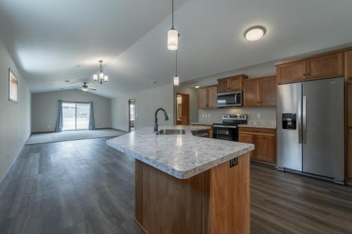 Seamless flow between living and dining areas creates an ideal layout for everyday living.