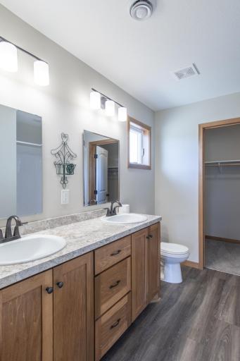 Well-appointed ensuite bathroom with modern finishes.