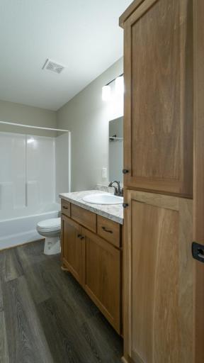 Clean and functional full bathroom conveniently located.