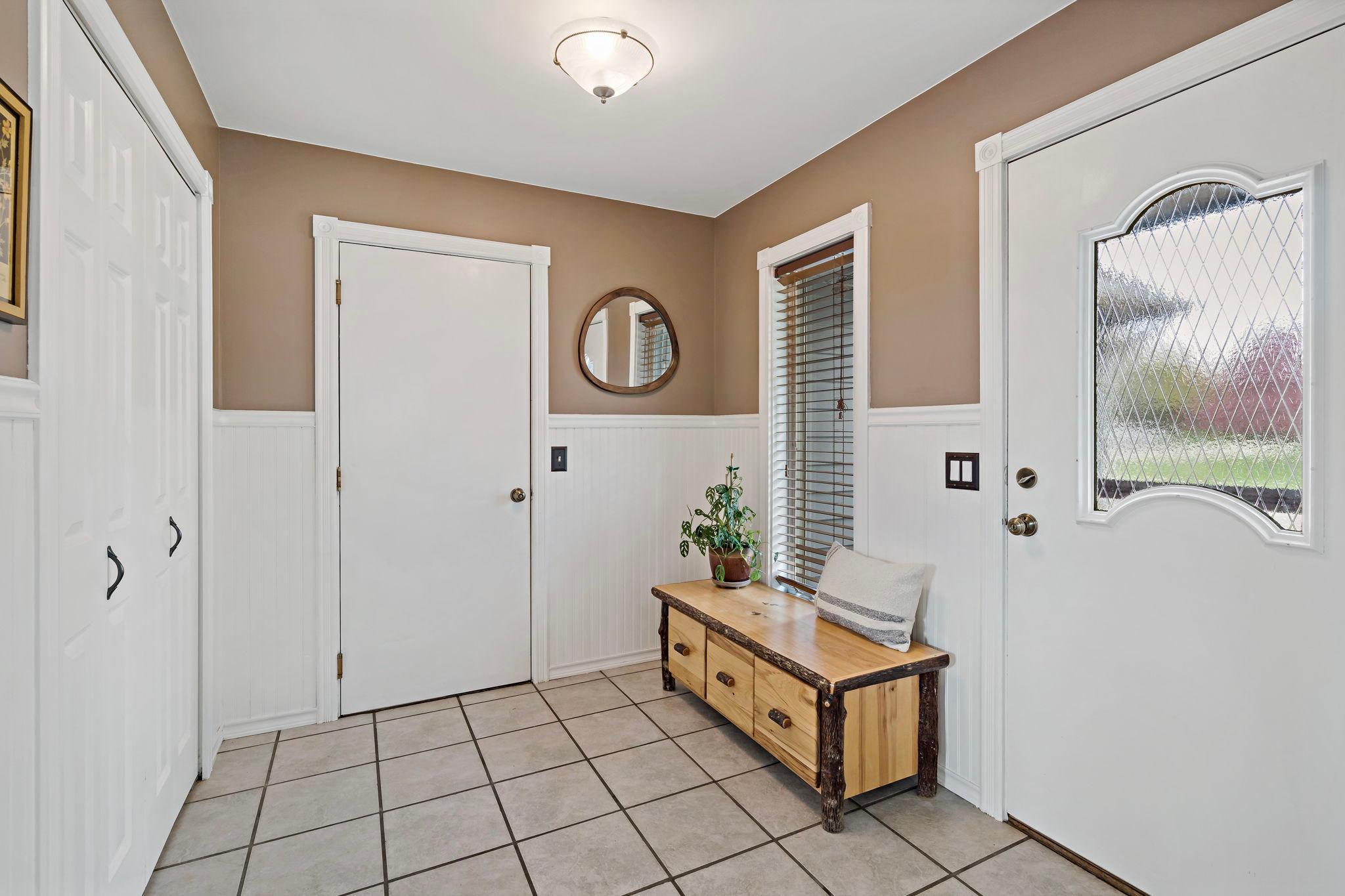 Step into a generous foyer designed for flow between the garage and the front porch. Plus, an oversized closet with room to tuck away your seasonal gear."