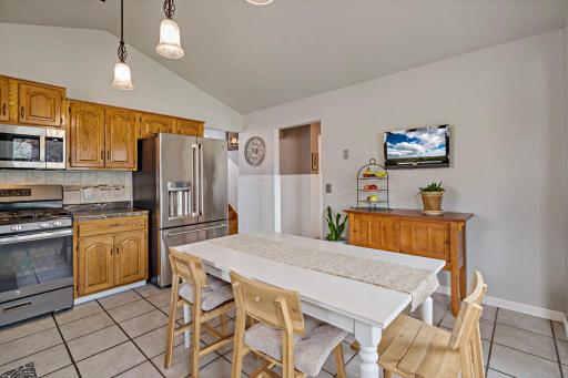 Walk on through to the dining room and upper/lower level stairwell.