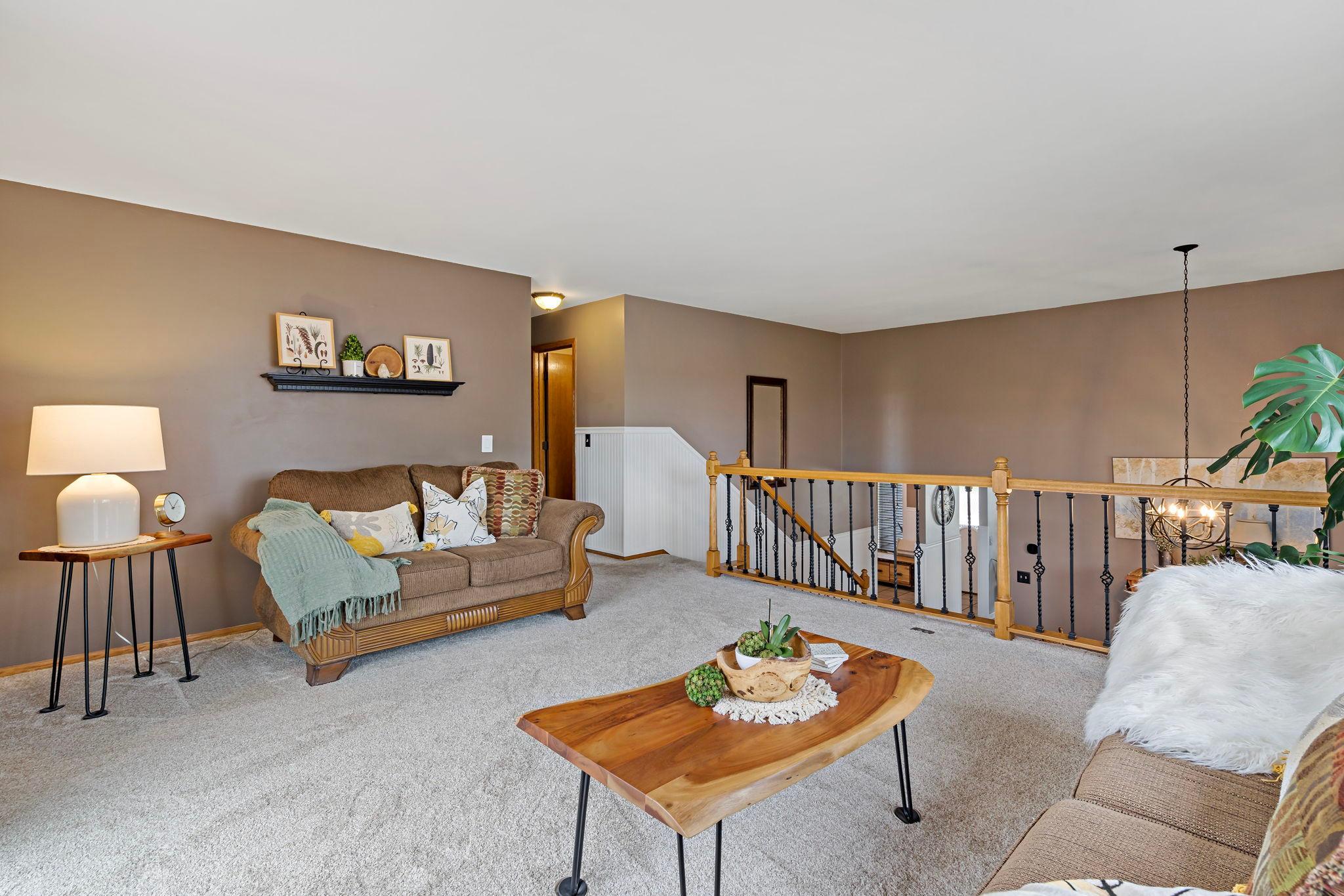 The colors match seamlessly with the space, with the wainscoting adding good dimension.
