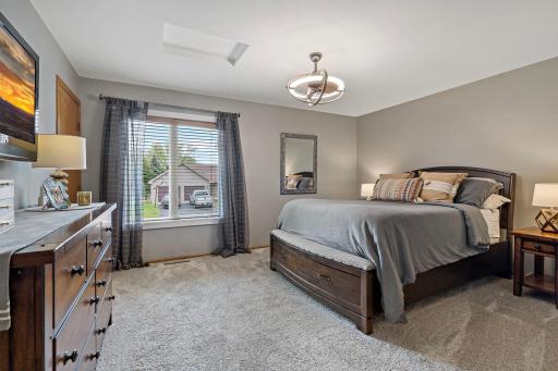 Spacious primary suite with walk-in closet and private direct access to the bathroom