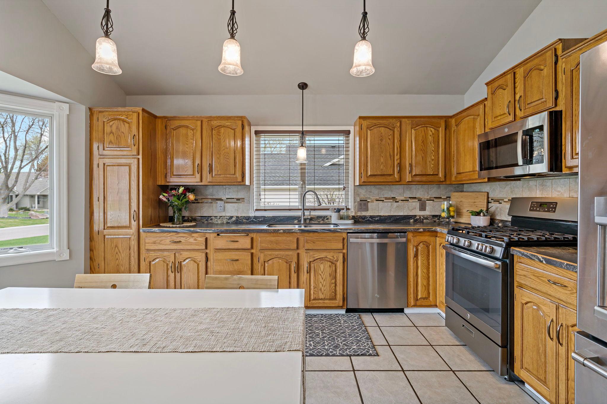 Newer stainless steel appliances installed in 2018 and microwave in 2025