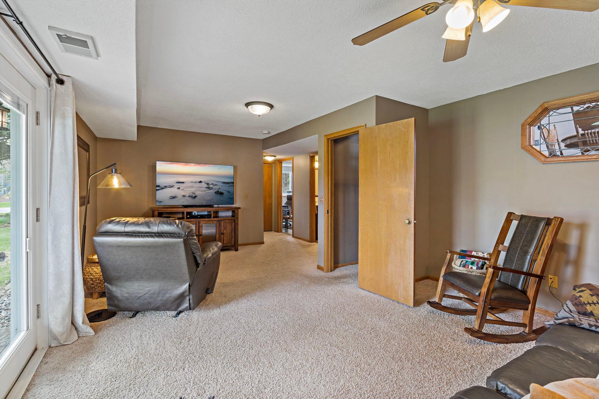 Lower level family room with a walk-out to lower level patio