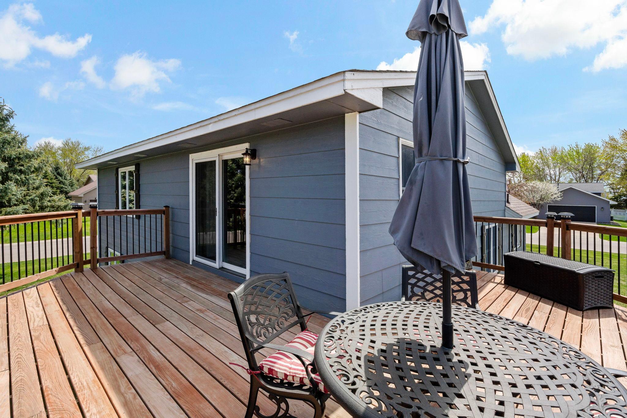 One of a kind wrap around deck with new spindles.