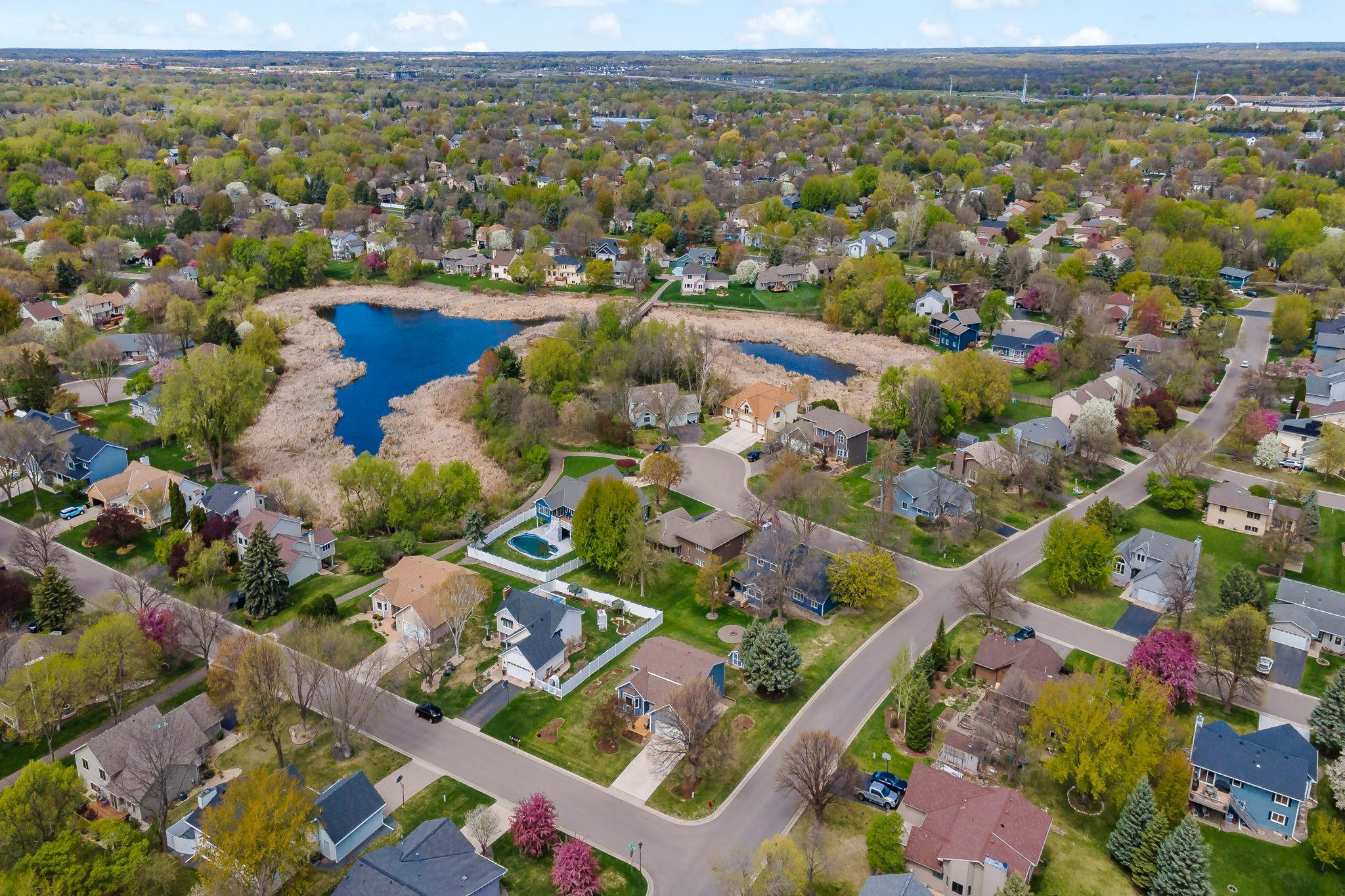 "Just two doors down, you’ll find the gateway to Maple Grove’s extensive trail system! Whether you’re walking or biking, these paved paths lead you on a scenic journey straight into the heart of Elm Creek Park Reserve."