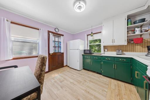 Kitchen windows keep the space bright and inviting.