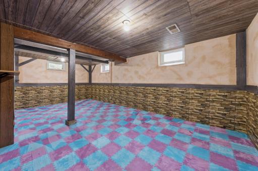 Large lower-level recreation space with endless possibilities.