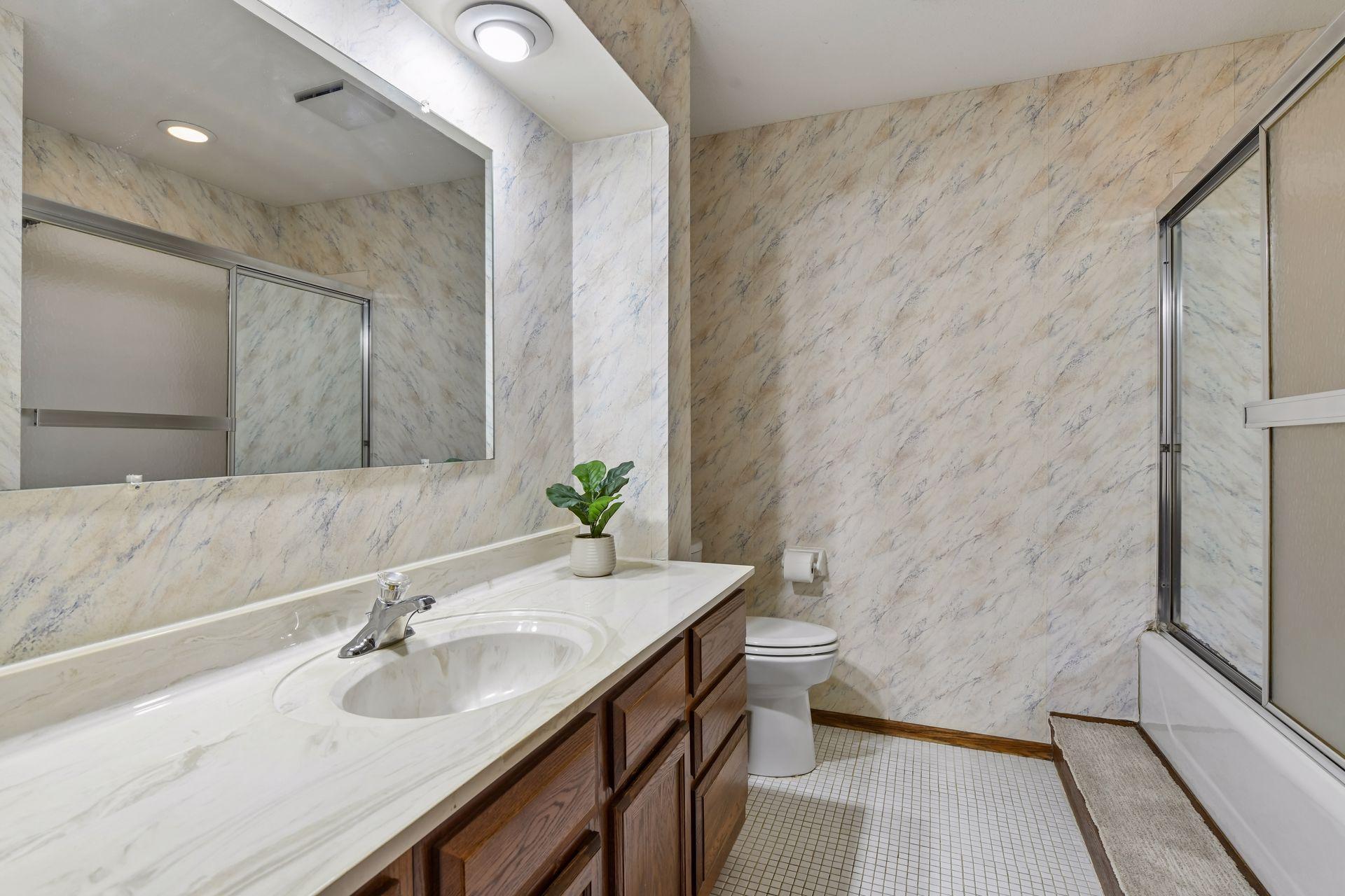 Main level full bathroom.