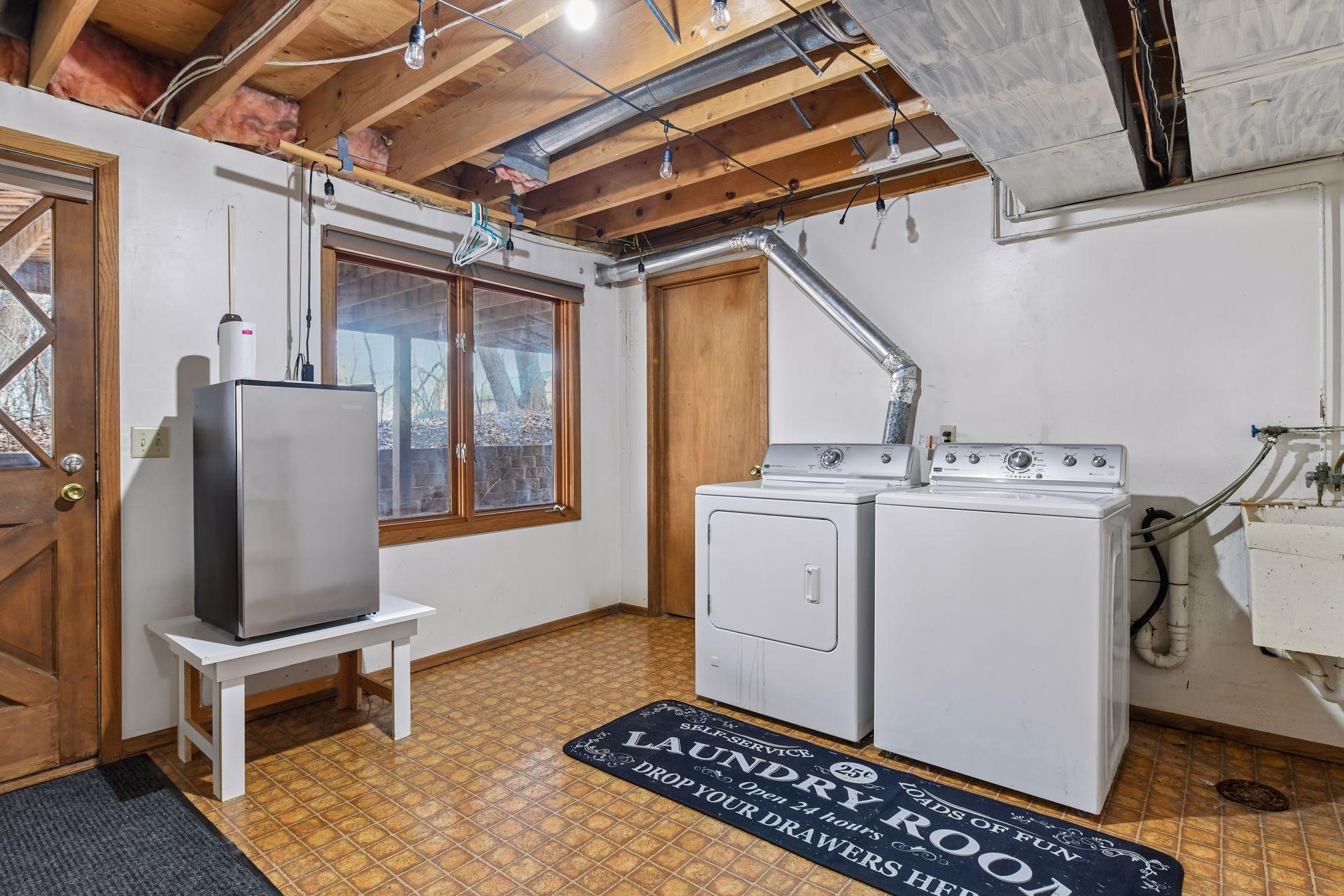 Laundry area. (Freezer can stay with the home.)