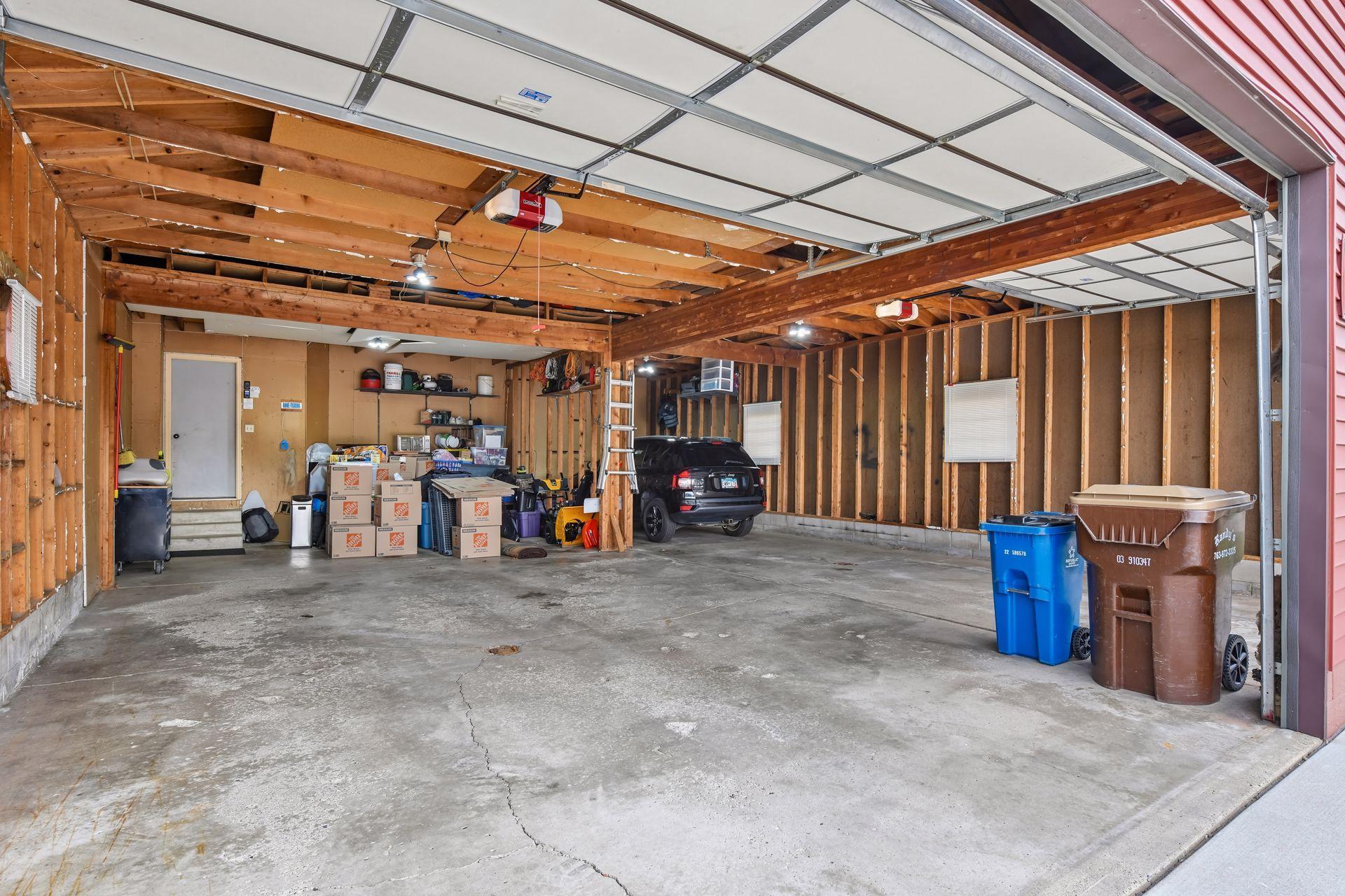 SIX-car garage with 10' garage doors.