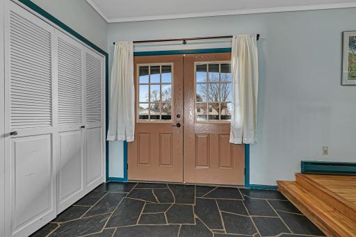 Step in through the double front doors and feel the convenience of a large front entry closet. Plenty of room for guests to come in then spread out.