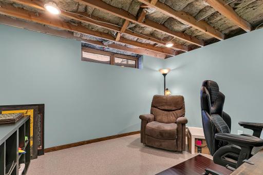 This office space is designed for quiet productivity thanks to Rockwool SafeânâSound insulation for enhanced sound dampening. The recessed lighting & a mission-style door complete the office and this room could easily be converted into a 5th bedroom