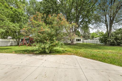 Fenced in backyard with room for the kids to play. Easily within walking distance to schools and parks when the kids want a change of pace from playing in the backyard.