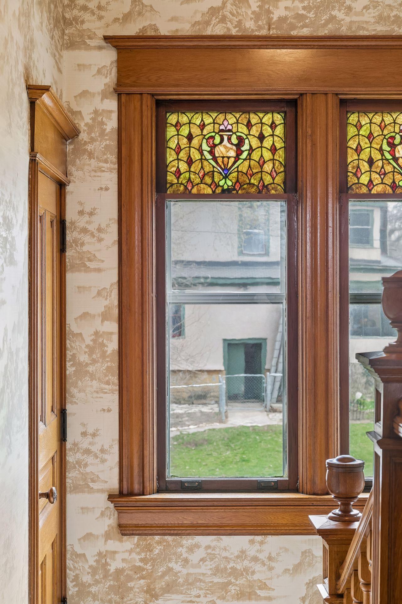 Door to the left is the staircase leading to the attic, which would make a wonderful bonus space to finish