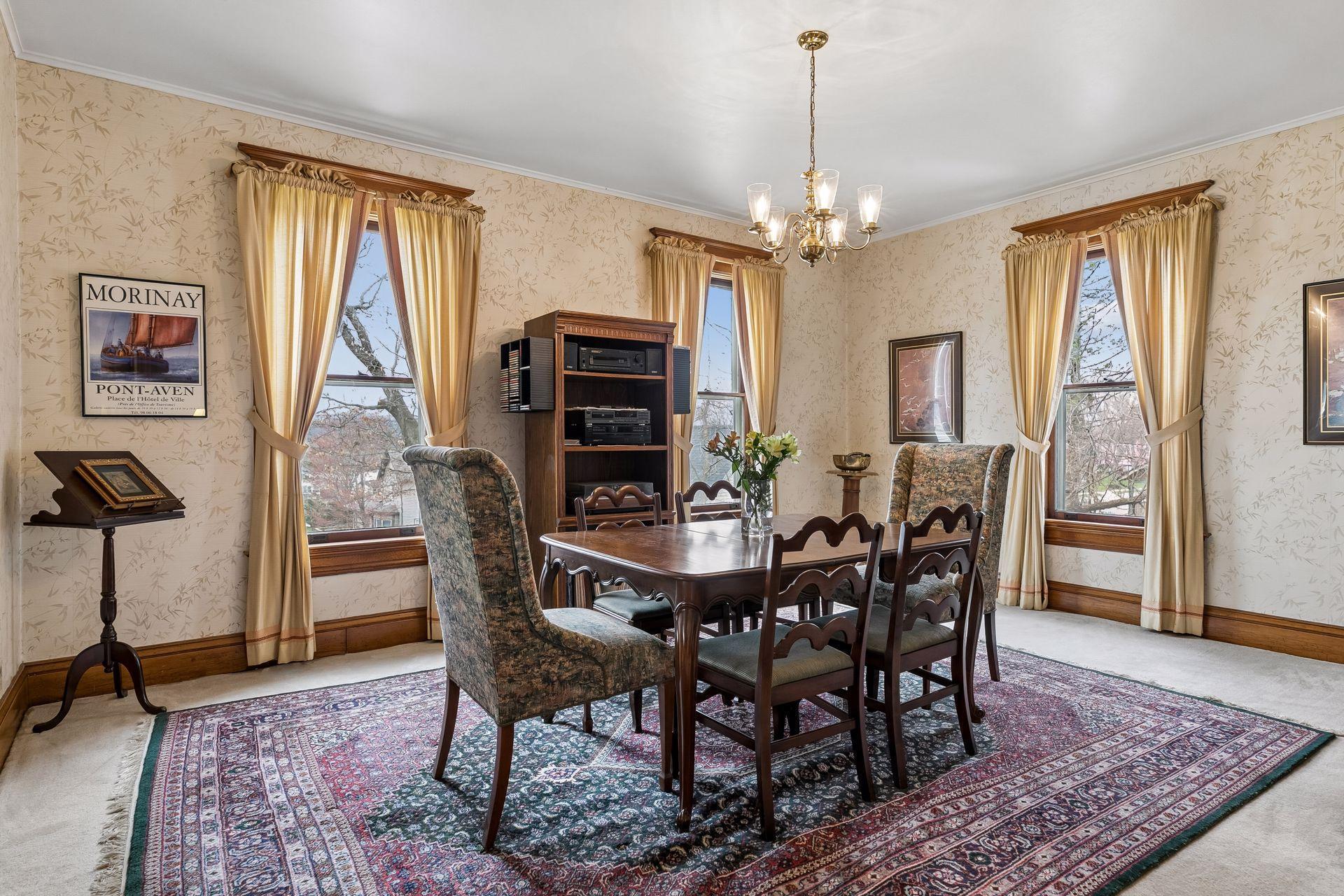 Formal dining area - light and bright with the large windows