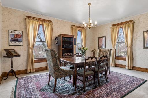 Formal dining area - light and bright with the large windows