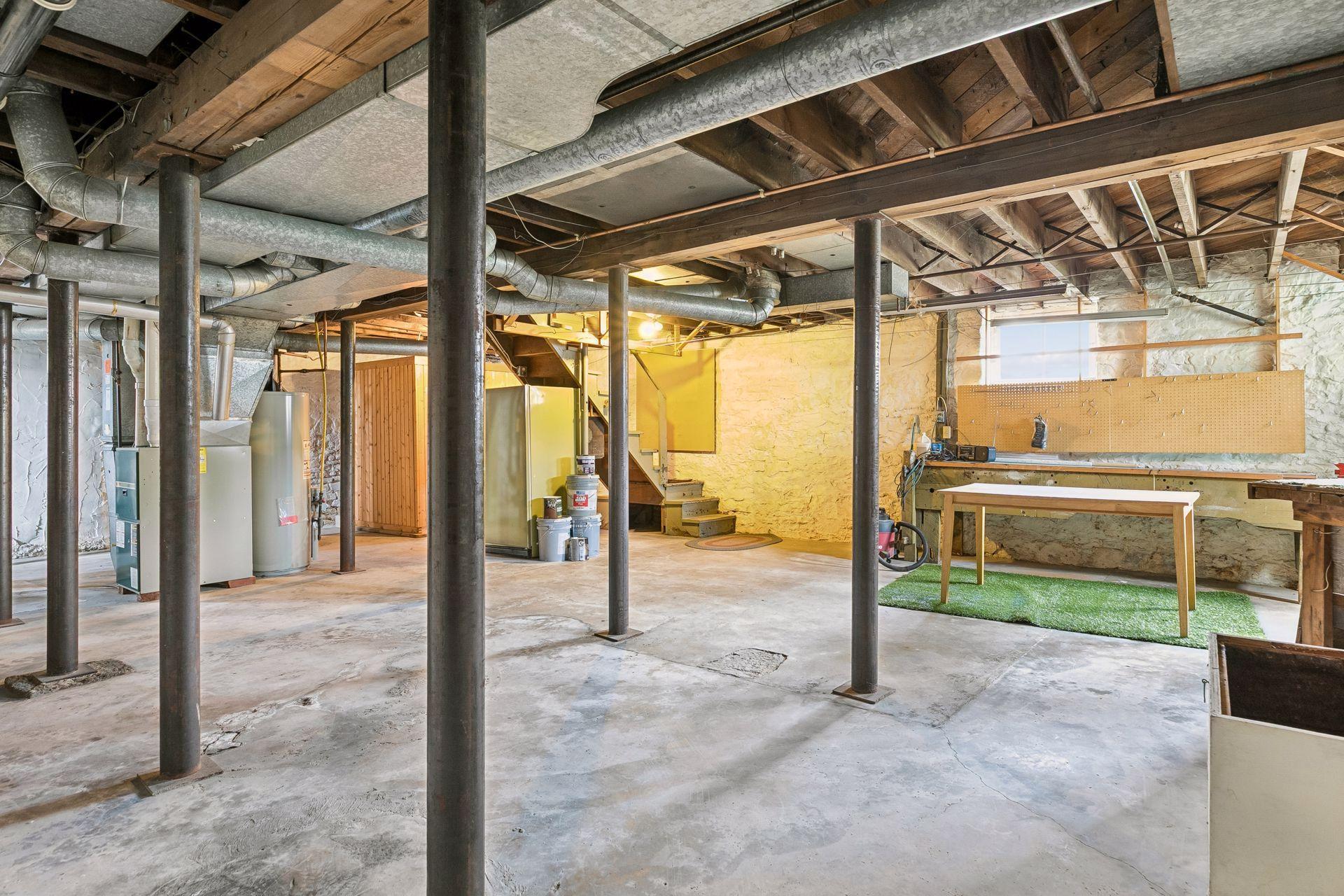 Full basement with a sauna, wine or fruit cellar, workbench, freezer and newer washer and dryer