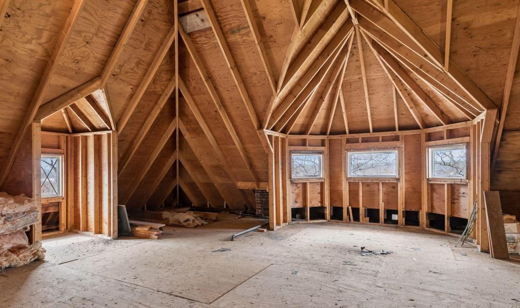 Third floor attic, new in 1989, great space for a studio or bonus room with its great curves and windows
