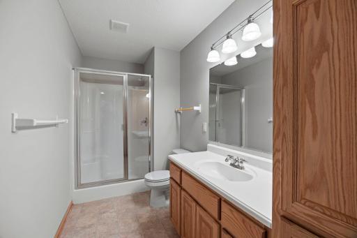 A convenient 3/4 bathroom on this level adds extra functionality and privacy.
