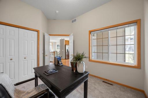 Also on the main floor, a versatile office offers flexible use, easily functioning as an additional bedroom.