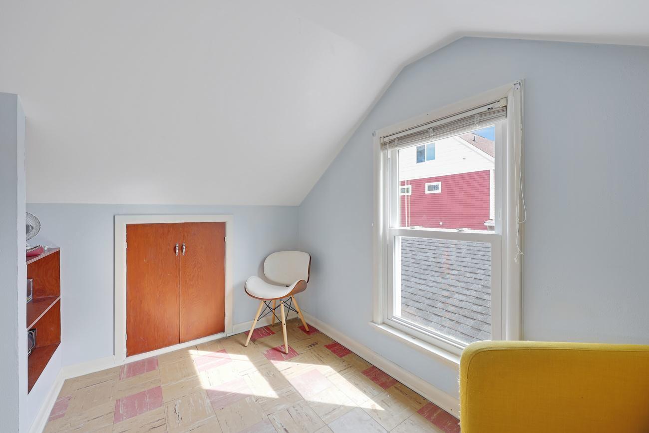 Upper level top of stairs sitting area near bedroom