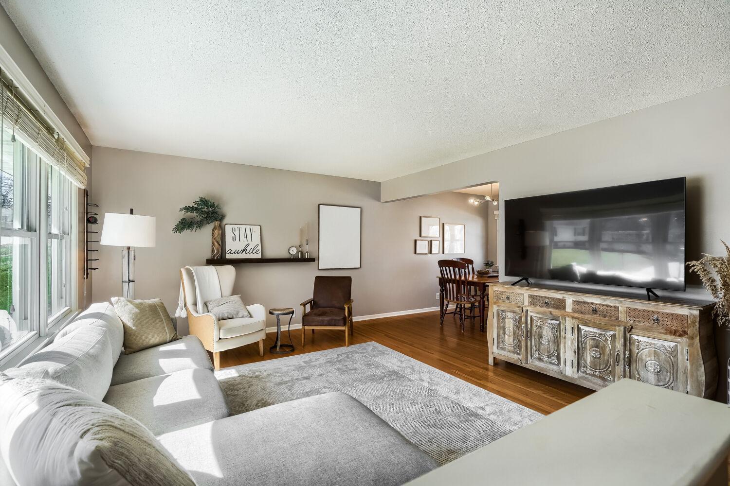 Living Room W/ Beautiful Hard Wood Floors