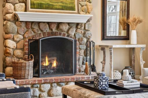 Wood burning fireplace sets the tone for this room