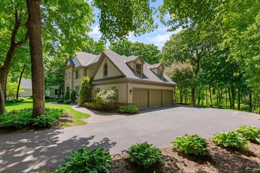 Beautiful setting on .52 acres of a wooded lot