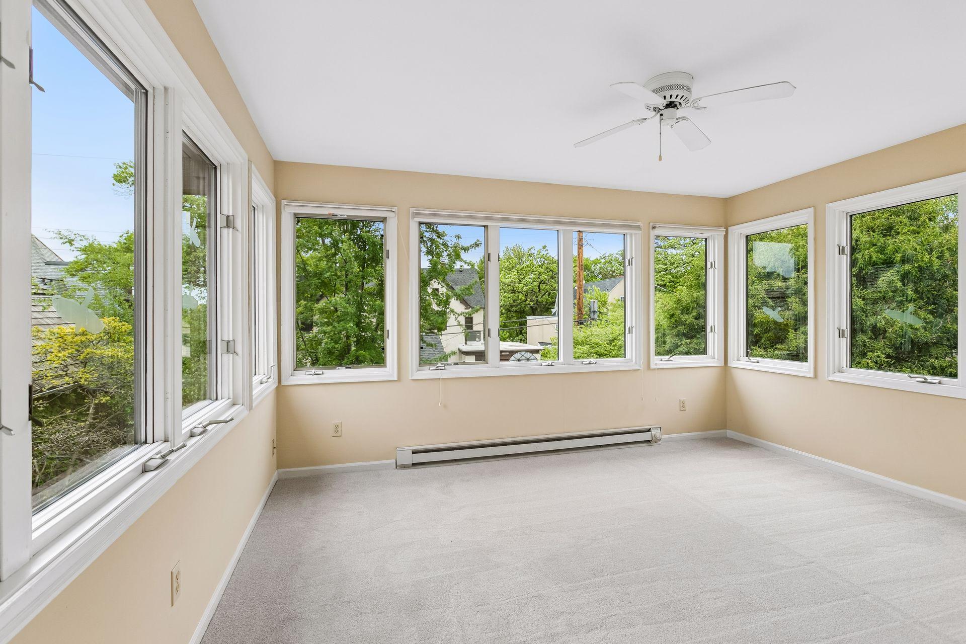 Private sunroom adjacent to primary bedroom